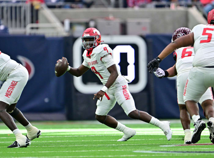 Junior QB Kaleb Bailey scrambles as North Shore grows its lead in a UIL regional football semifinal blowout over Cy-Fair on Friday.